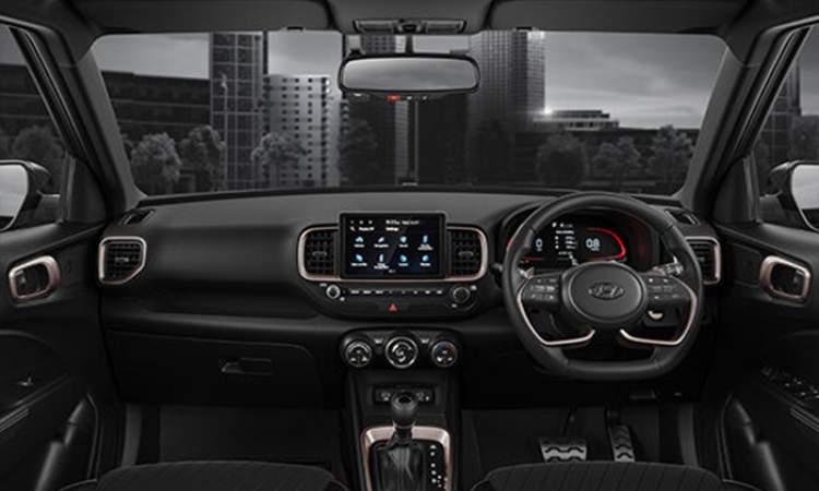 All black interiors with brass coloured inserts